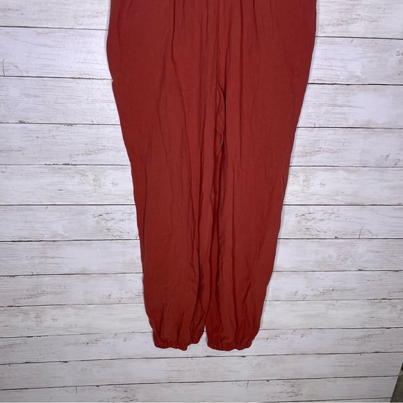 Entro Ruffle V Neck Jogger Jumpsuit Rust Red - Picture 3 of 4